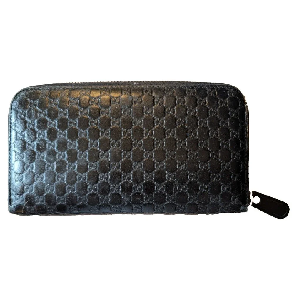GUCCI Round Zip Micro Guccissima Wallet